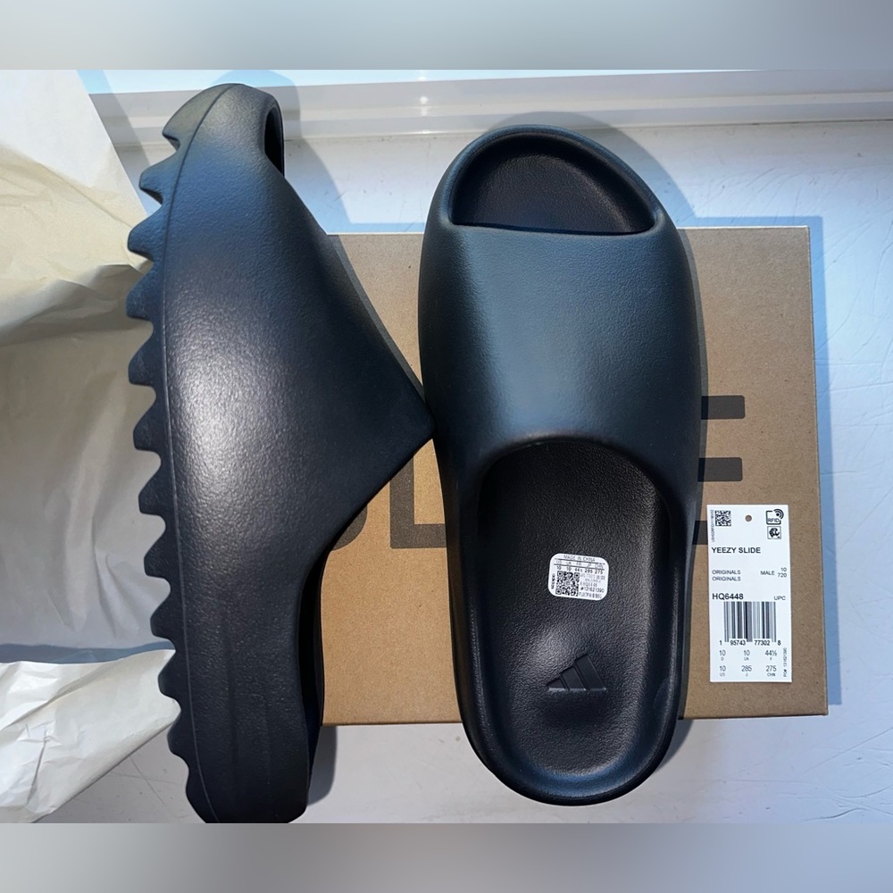 Yeezy Slide. Adult size 10. Slate Grey. Brand New in the box.